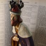 christian figurine, the king, open bible-2778587.jpg